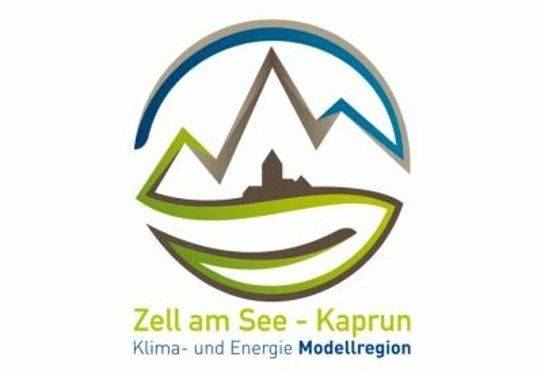 Rundes Logo mit Berg und Gebäude in der Mitte von der Klima- und Energie Modellregion Zell am See-Kaprun
