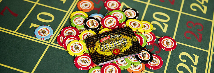 Casinos Austria Roulette Close-Up Tableau Jeton-Berg und ein Plaque zu 10000 Euro