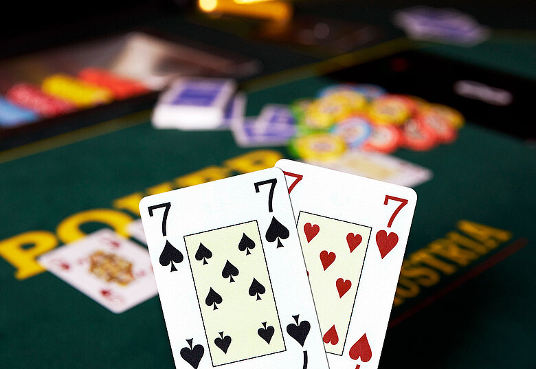 Lucky 7 Poker Cash Game Aktion Pokerhand mit zwei Siebenern