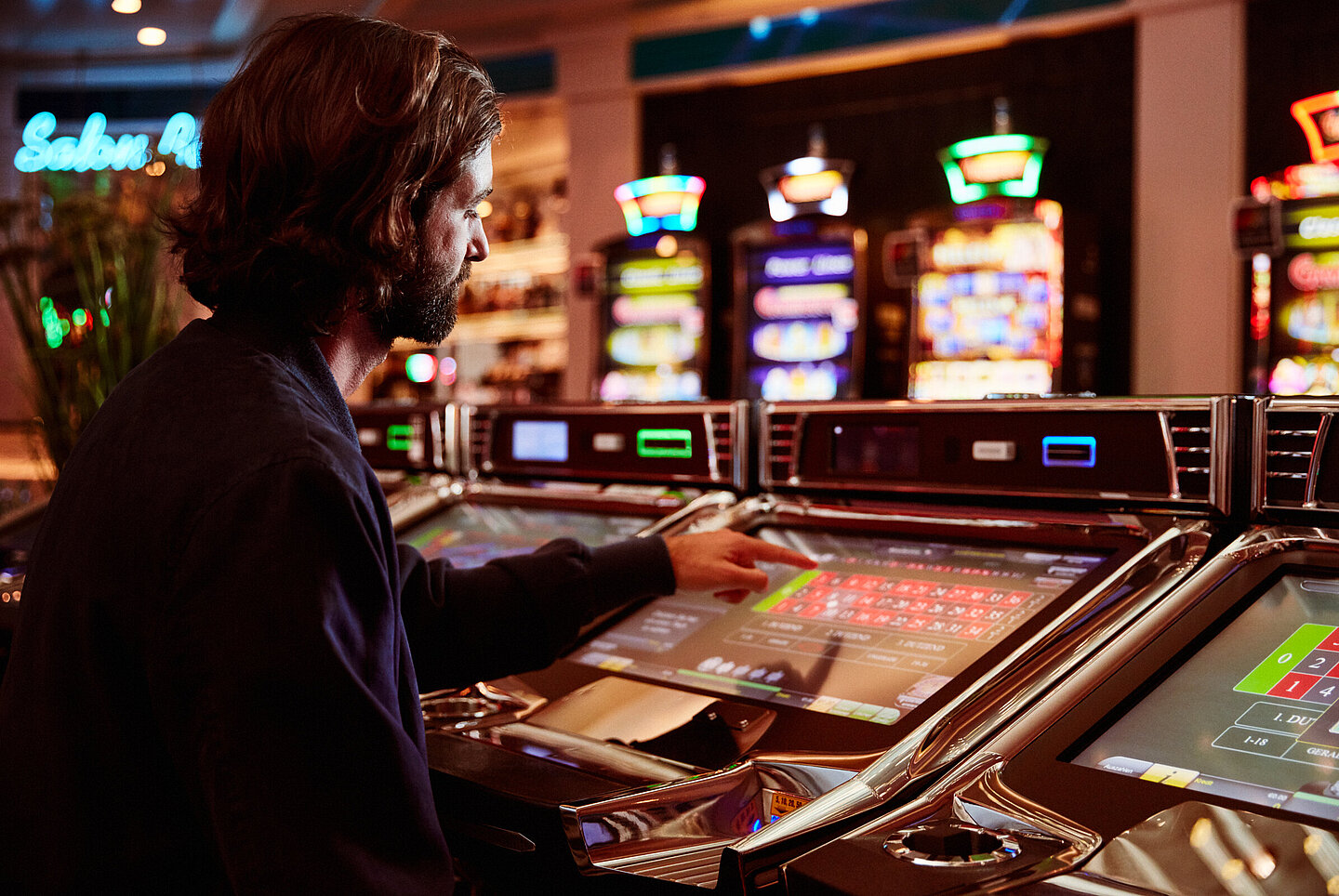 man on Easy Roulette machine