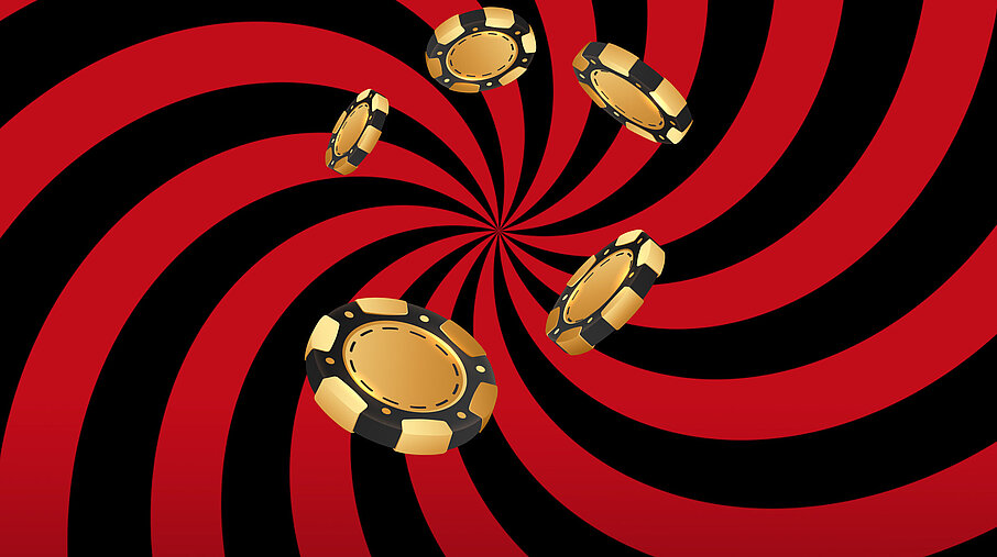 Goldene Jetons auf eine rot-schwarzem Hintergrund