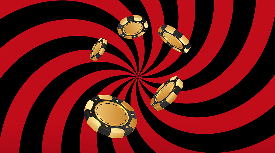 Goldene Jetons auf eine rot-schwarzem Hintergrund