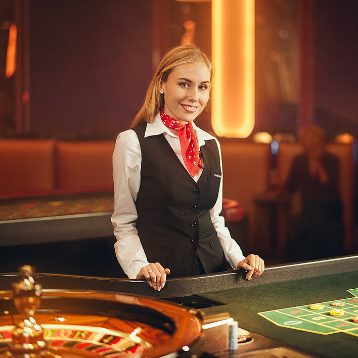 Croupiere am Roulette Tisch