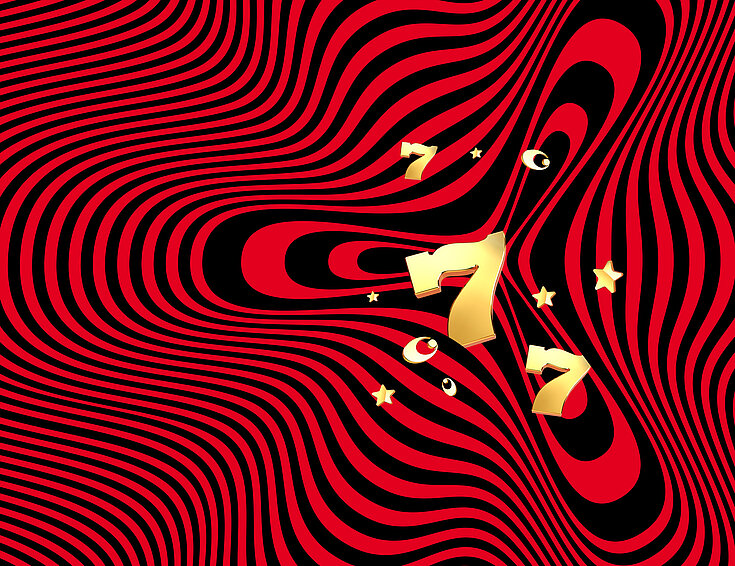 Goldene Zahl 7 auf schwarz-rotem Hintergrund