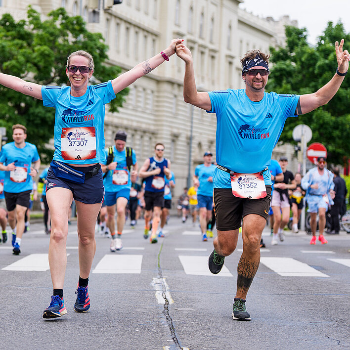 Wings for Life World Run 2025 jubelnde Läufer:innen